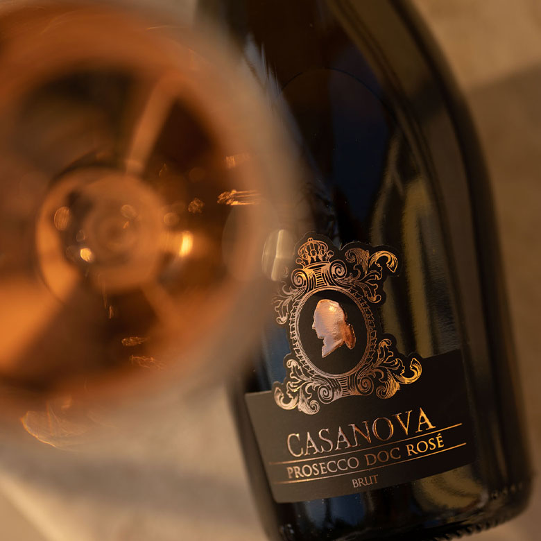 A glass and a bottle of Casanova Prosecco Rosé