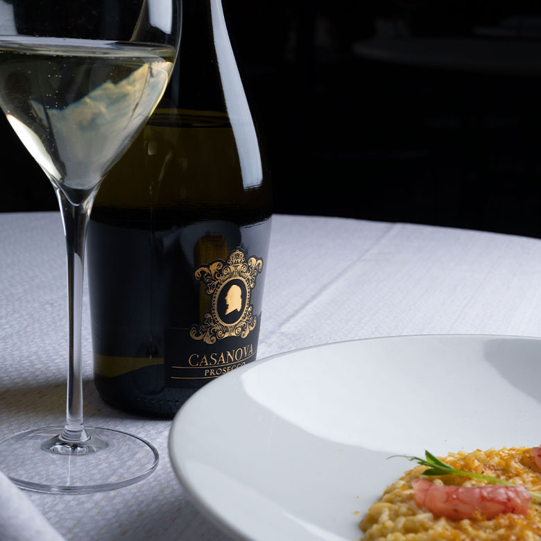 Pumpkin risottto with bottarga and red prawns, made using and served with Casanova Prosecco Brut DOC